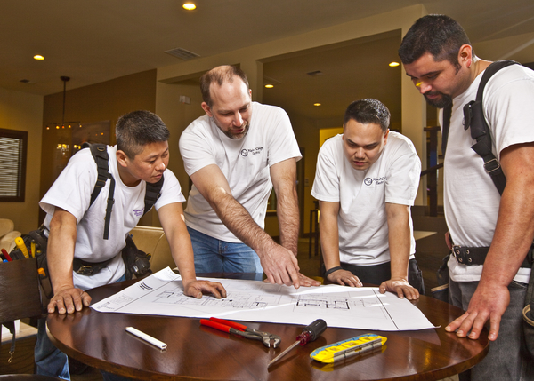 Crew reviews a plan, led by Nathan.